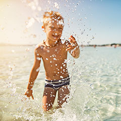 Boy splashing